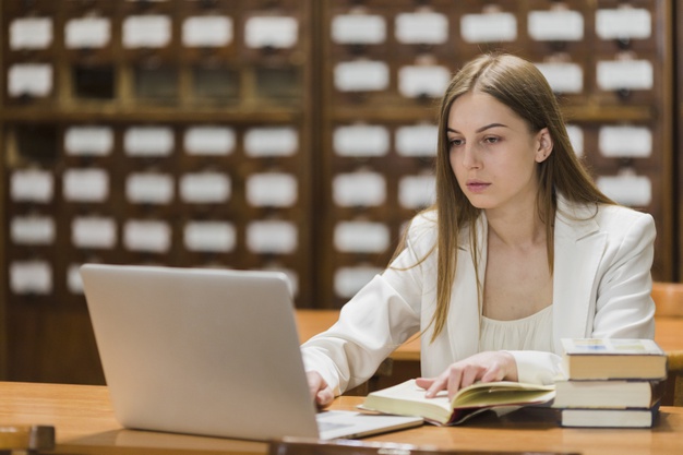 back-school-concept-with-woman-studying-library_23-2148172388